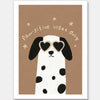 Smiling dalmatian pup with heart sunglasses and a “pawsitive vibes only” slogan on a warm brown background, from the Little Tails Collection by Urban Road.