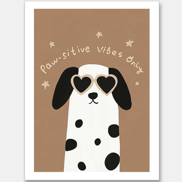 Smiling dalmatian pup with heart sunglasses and a “pawsitive vibes only” slogan on a warm brown background, from the Little Tails Collection by Urban Road.