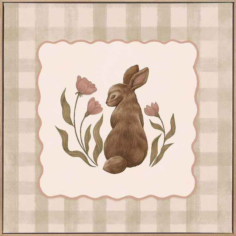 A sweet brown bunny framed by flowers and leaves on a soft green gingham backdrop, from the Little Tails Collection by Urban Road.