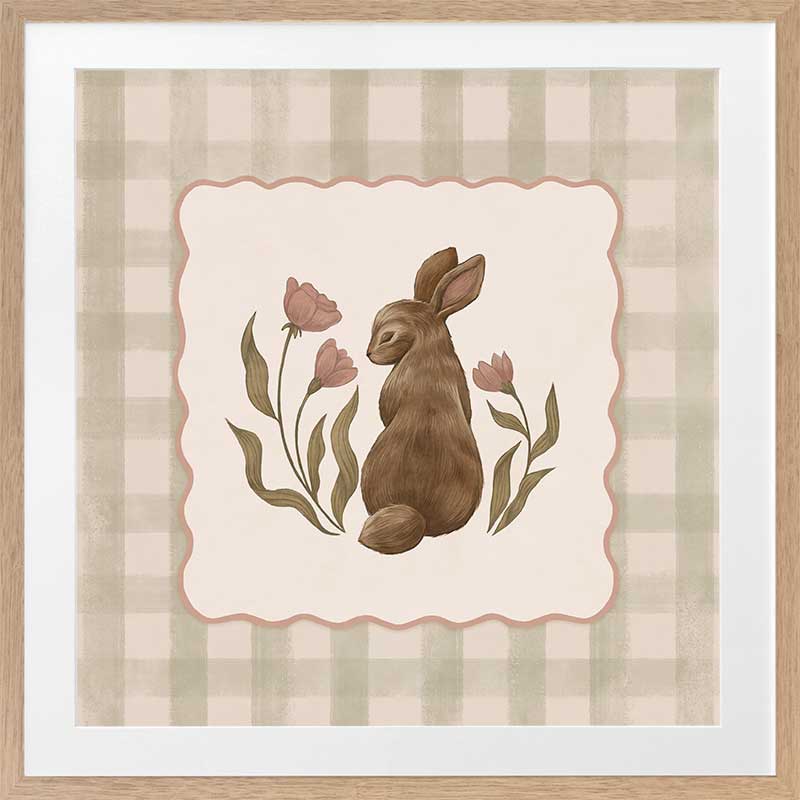 A sweet brown bunny framed by flowers and leaves on a soft green gingham backdrop, from the Little Tails Collection by Urban Road.