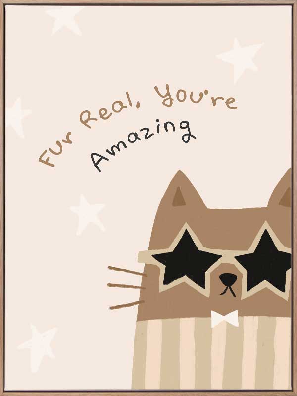 A friendly cat wearing star-shaped sunglasses with the hand-lettered message “fur real, you’re amazing” and small stars, in soft neutral browns, from the Little Tails Collection by Urban Road.
