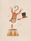 An acrobatic monkey does a handstand on a circus pedestal with a floating top hat and confetti, in neutral red accents, from the Little Tails Collection by Urban Road.