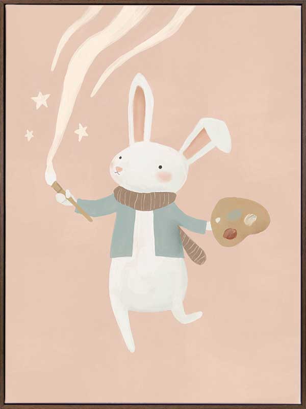 A white bunny holds a paintbrush and palette, sweeping playful painted swirls and star shapes across a pastel pink backdrop, from the Little Tails Collection by Urban Road.