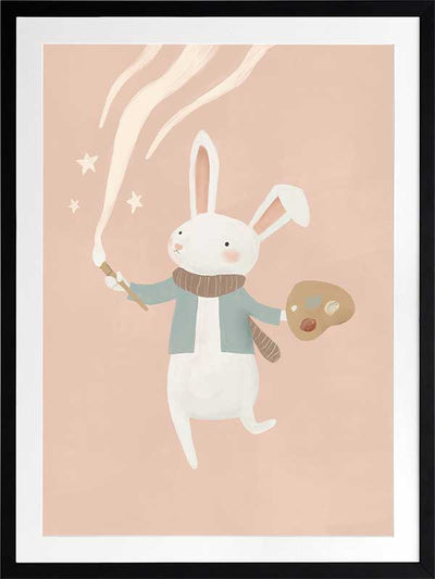 A white bunny holds a paintbrush and palette, sweeping playful painted swirls and star shapes across a pastel pink backdrop, from the Little Tails Collection by Urban Road.