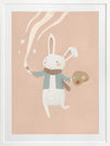 A white bunny holds a paintbrush and palette, sweeping playful painted swirls and star shapes across a pastel pink backdrop, from the Little Tails Collection by Urban Road.