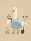 A goose in blue coveralls holds a flower pot and shovel among tiny blossoms, from the Little Tails Collection by Urban Road.