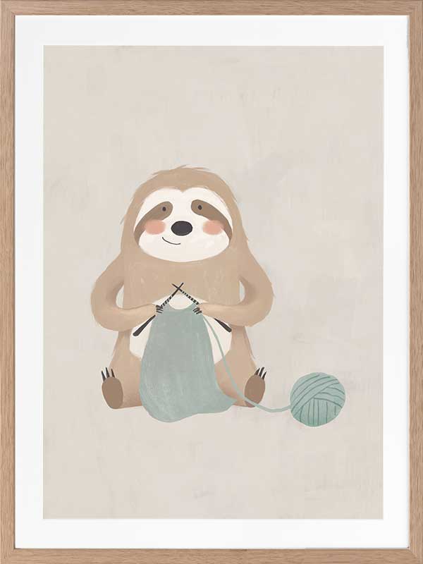 A relaxed sloth sits knitting with a ball of yarn in soft grey-brown tones, from the Little Tails Collection by Urban Road.