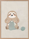 A relaxed sloth sits knitting with a ball of yarn in soft grey-brown tones, from the Little Tails Collection by Urban Road.