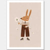 A gentle orange rabbit in striped pants holding a fluffy dandelion, making a wish amid soft neutral tones, from the Little Tails Collection by Urban Road.