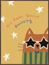 Cheeky cat in star sunglasses with the message “Fur real, you’re amazing” on a sunny yellow ground, from the Little Tails Collection by Urban Road.