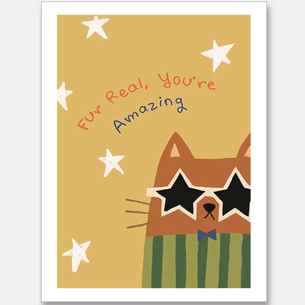 Cheeky cat in star sunglasses with the message “Fur real, you’re amazing” on a sunny yellow ground, from the Little Tails Collection by Urban Road.