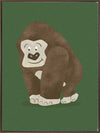 Gentle gorilla “Grady” sits against a deep green backdrop, from the Little Tails Collection by Urban Road.