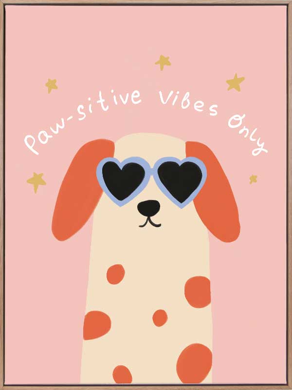 Smiling spotted dog with heart sunglasses under the phrase “Pawsitive Vibes Only” on a pink background, from the Little Tails Collection by Urban Road.