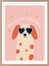 Smiling spotted dog with heart sunglasses under the phrase “Pawsitive Vibes Only” on a pink background, from the Little Tails Collection by Urban Road.