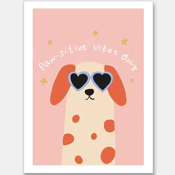 Smiling spotted dog with heart sunglasses under the phrase “Pawsitive Vibes Only” on a pink background, from the Little Tails Collection by Urban Road.