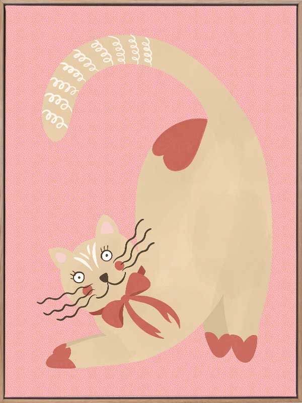 A curious cream cat with a red bow stretches on a blush-pink background in a charming storybook style, from the Little Tails Collection by Urban Road.