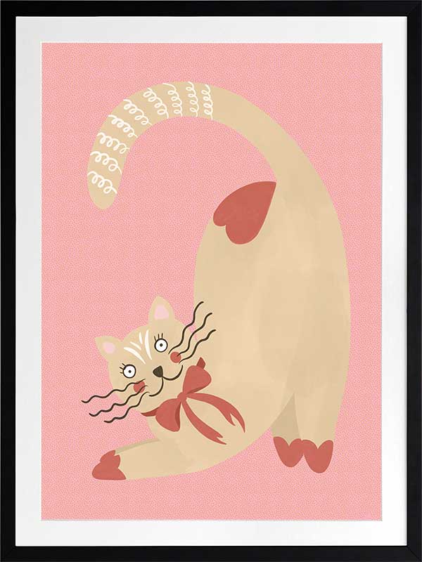 A curious cream cat with a red bow stretches on a blush-pink background in a charming storybook style, from the Little Tails Collection by Urban Road.