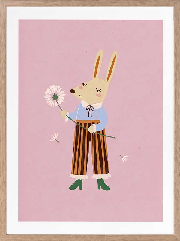 A dapper kangaroo holding a dandelion on a soft pink background with drifting seeds, from the Little Tails collection by Urban Road.
