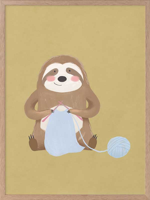 A smiling sloth knitting a blue scarf on a warm olive-gold background, from the Little Tails collection by Urban Road.