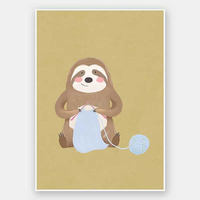 A smiling sloth knitting a blue scarf on a warm olive-gold background, from the Little Tails collection by Urban Road.