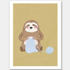 A smiling sloth knitting a blue scarf on a warm olive-gold background, from the Little Tails collection by Urban Road.