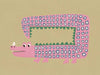 A quirky pink-dotted crocodile with a long rectangular body on a sage ground, from the Little Tails collection by Urban Road.