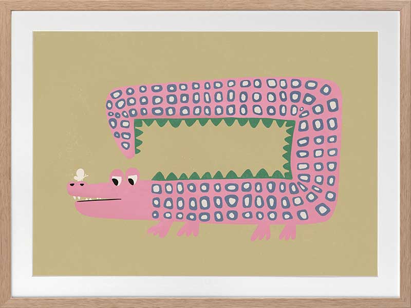 A quirky pink-dotted crocodile with a long rectangular body on a sage ground, from the Little Tails collection by Urban Road.