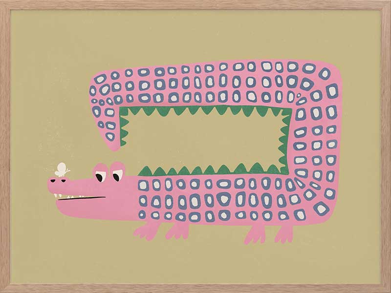 A quirky pink-dotted crocodile with a long rectangular body on a sage ground, from the Little Tails collection by Urban Road.