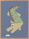 A cheerful crocodile in striped pyjamas floating on a blue background, from the Little Tails collection by Urban Road.