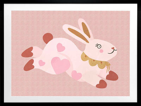 A leaping pink bunny sprinkled with heart patches on a textured blush ground, from the Little Tails collection by Urban Road.