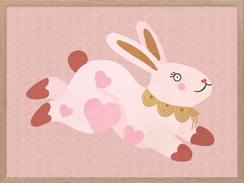 A leaping pink bunny sprinkled with heart patches on a textured blush ground, from the Little Tails collection by Urban Road.