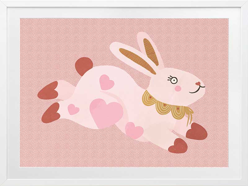 A leaping pink bunny sprinkled with heart patches on a textured blush ground, from the Little Tails collection by Urban Road.