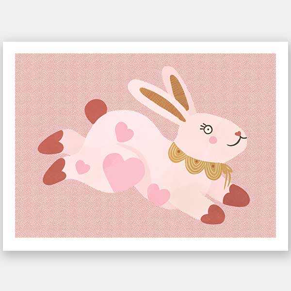 A leaping pink bunny sprinkled with heart patches on a textured blush ground, from the Little Tails collection by Urban Road.