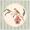 Charming bird perched by a tiny house within a soft green pastel medallion, from the Little Tails Collection by Urban Road.