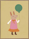 Rabbit in a pink striped dress holding a green balloon on a warm gold backdrop with pink accents, from the Little Tails Collection by Urban Road.
