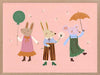 Two rabbits and a mouse parade with a balloon and umbrella across a pink backdrop, from the Little Tails Collection by Urban Road.