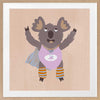 Cheerful koala in a lilac superhero outfit with a cape and striped leggings on warm beige, from the Little Tails Collection by Urban Road.