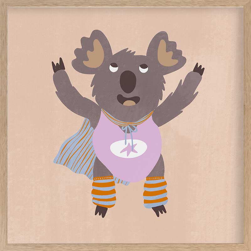Cheerful koala in a lilac superhero outfit with a cape and striped leggings on warm beige, from the Little Tails Collection by Urban Road.