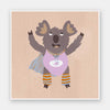 Cheerful koala in a lilac superhero outfit with a cape and striped leggings on warm beige, from the Little Tails Collection by Urban Road.