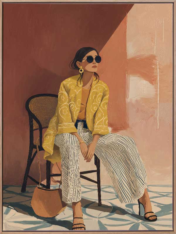 A seated woman in patterned pants and a yellow blouse leans casually against a terracotta wall. From the Lounging Ladies II collection by Urban Road.
