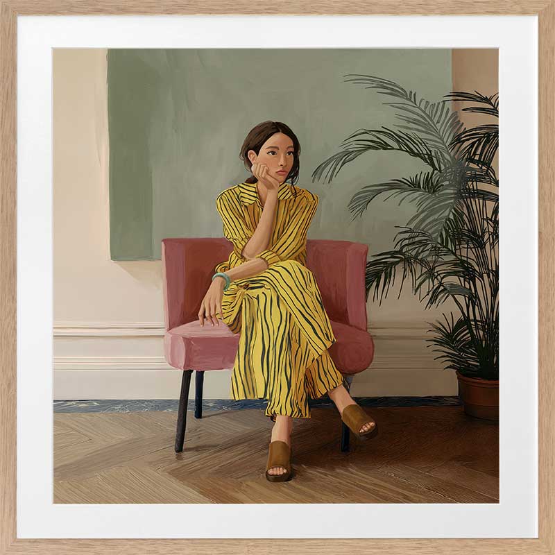 Portrait of a woman in yellow stripes sitting offline in a muted room setting, from the Lounging Ladies II collection by Urban Road.