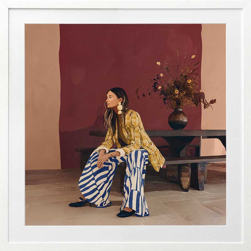 A woman in yellow seated against a moody blue and red backdrop, wearing bold striped pants, from the Lounging Ladies II collection by Urban Road.
