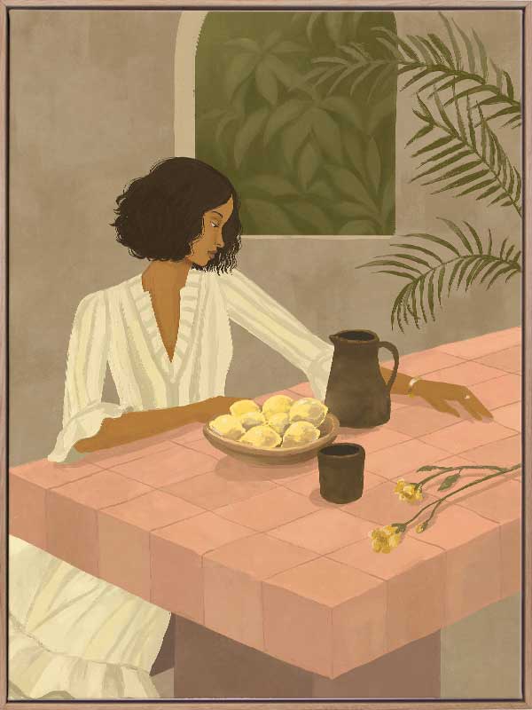 A woman sits beside a plate of lemons on a soft pink tiled table in a quiet interior. From the Lounging Ladies II collection by Urban Road.