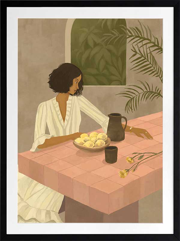 A woman sits beside a plate of lemons on a soft pink tiled table in a quiet interior. From the Lounging Ladies II collection by Urban Road.