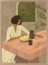 A woman sits beside a plate of lemons on a soft pink tiled table in a quiet interior. From the Lounging Ladies II collection by Urban Road.
