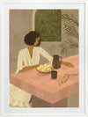 A woman sits beside a plate of lemons on a soft pink tiled table in a quiet interior. From the Lounging Ladies II collection by Urban Road.