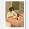 A woman sits beside a plate of lemons on a soft pink tiled table in a quiet interior. From the Lounging Ladies II collection by Urban Road.