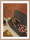 Illustration of a woman relaxing on a neutral sofa with warm orange surroundings and soft plant details, from the Lounging Ladies II collection by Urban Road.
