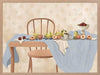 A wooden chair and table are set with pears, peaches, and plums over soft blue and cream linens. From the Lounging Ladies II collection by Urban Road.
