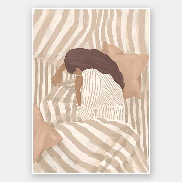 A woman in striped sleepwear curls under soft bedding in warm neutral tones. From the Lounging Ladies II collection by Urban Road.